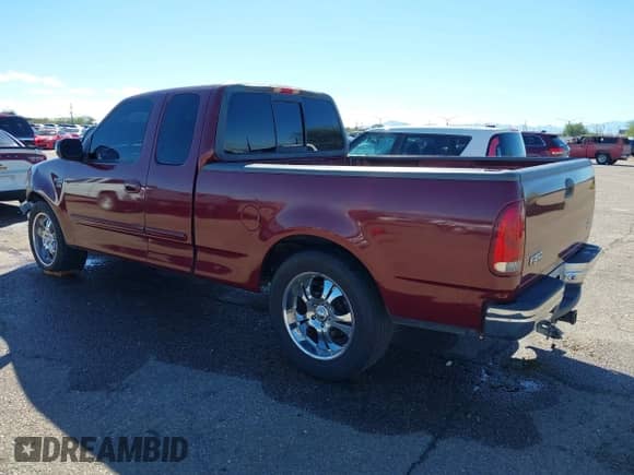 1999 Ford F-150 with VIN 1FTRX17W3XKB03527, listed as a IAAI auction lot 43450405 with 121,752 mi miles and . Bid and sale history available at DreamBid. Image 3.
