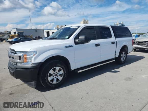 2020 Ford F-150 XL with VIN 1FTEW1C54LKD33666, listed as a Copart auction lot 85561585 with 126,781 mi miles and Salvage title. Bid and sale history available at DreamBid. Image 1.