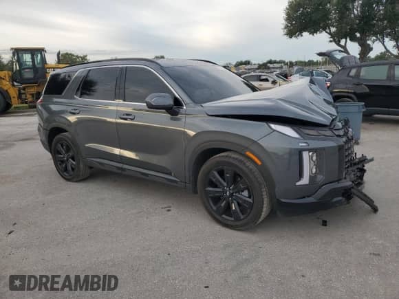 2024 Hyundai Palisade XRT z VIN KM8R34GE7RU725068, wystawiony jako Copart lot #81010855 z przebiegiem 50 987 mil mil oraz Nie do naprawy • Non repairable. Historia ofert i sprzedaży dostępna na DreamBid. Obrazek 4.