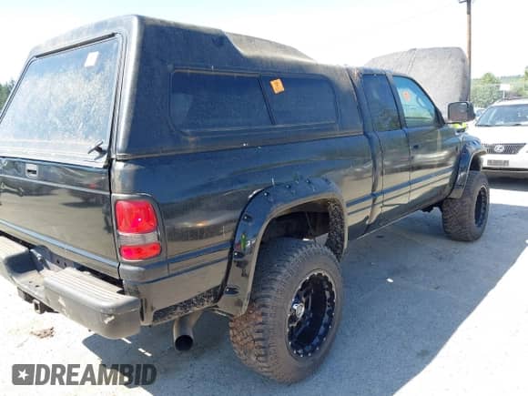 2002 Dodge 2500 with VIN 3B7KF23682M230243, listed as a IAAI auction lot 42695583 with 302,233 mi miles and . Bid and sale history available at DreamBid. Image 4.