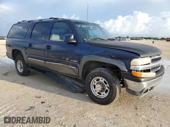 2001 Chevrolet Suburban LT with VIN 3GNGC26U21G119300, listed as a Copart auction lot 68131044 with 147,430 mi miles and Salvage title. Bid and sale history available at DreamBid. Image 4.