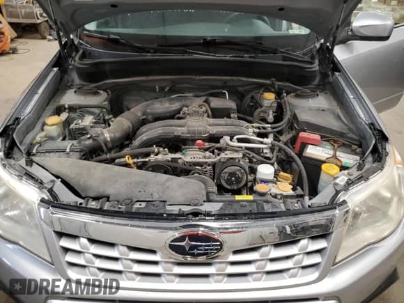 2012 Subaru Forester X Premium z VIN JF2SHBDC0CH431365, wystawiony jako Copart lot #68971585 z przebiegiem 71 752 mil mil oraz Czysty tytuł • Clean title. Historia ofert i sprzedaży dostępna na DreamBid. Obrazek 12.