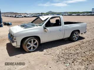 1995 Nissan Frontier z VIN 1N6SD11S7SC475209, wystawiony jako Copart lot #67856375 z przebiegiem 246 193 mil mil oraz Szkoda całkowita • Salvage title. Historia ofert i sprzedaży dostępna na DreamBid. Obrazek 1.