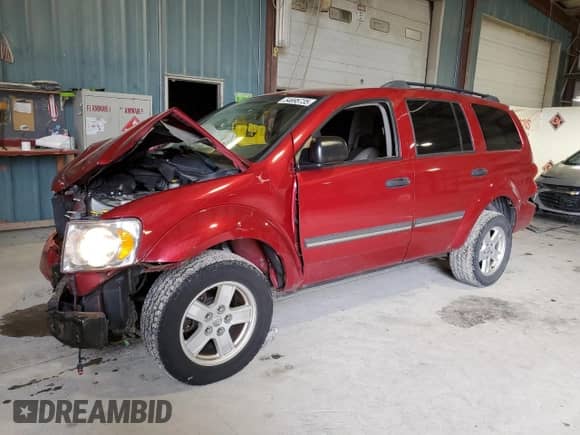 2007 Dodge Durango SLT with VIN 1D8HB48P47F570243, listed as a Copart auction lot 54695735 with 144,443 mi miles and Salvage title. Bid and sale history available at DreamBid. Image 1.