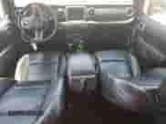 2021 Jeep Wrangler Unlimited Sahara with VIN 1C4HJXEN6MW590284, listed as a Copart auction lot 61804035 with 74,789 mi miles and Salvage title. Bid and sale history available at DreamBid. Image 8.