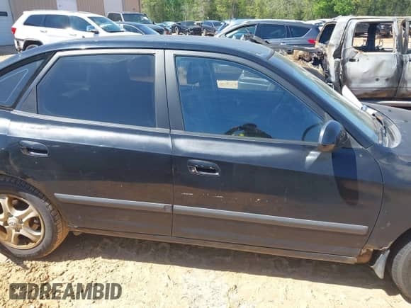 2005 Hyundai Elantra GLS z VIN KMHDN56D35U150190, wystawiony jako IAAI lot #42005231 z przebiegiem 217 677 mil mil oraz . Historia ofert i sprzedaży dostępna na DreamBid. Obrazek 13.