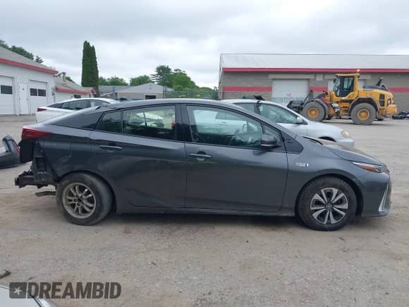 2018 Toyota Prius Plus z VIN JTDKARFP7J3083814, wystawiony jako IAAI lot #42511795 z przebiegiem 138 255 mil mil oraz . Historia ofert i sprzedaży dostępna na DreamBid. Obrazek 14.