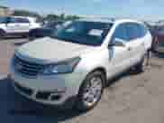 2013 Chevrolet Traverse LT with VIN 1GNKRGKD7DJ258465, listed as a IAAI auction lot 43003995 with 134,052 mi miles and . Bid and sale history available at DreamBid. Image 2.