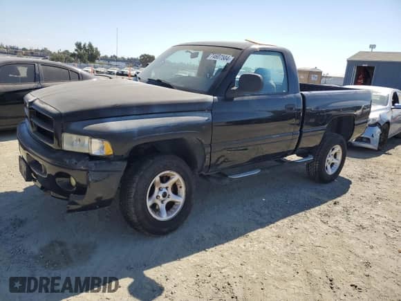 2001 Dodge 1500 with VIN 1B7HF16Y61S186508, listed as a Copart auction lot 74607504 with 105,360 mi miles and Salvage title. Bid and sale history available at DreamBid. Image 1.