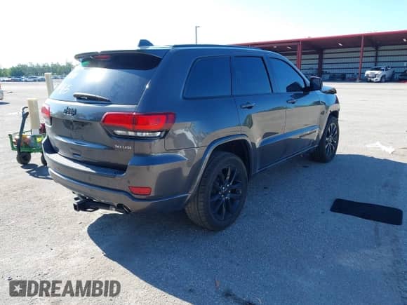 2020 Jeep Grand Cherokee Laredo E with VIN 1C4RJEAGXLC244965, listed as a IAAI auction lot 43026734 with 70,553 mi miles and . Bid and sale history available at DreamBid. Image 4.