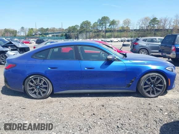 2024 BMW i4 M50 с VIN WBY33AW09RFS60679, выставлен на аукционе IAAI как лот 41983706 с пробегом 2 665 миль миль и . История ставок и продаж доступна на DreamBid. Изображение 13.