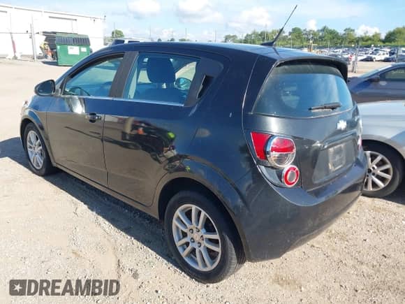 2014 Chevrolet Sonic LT with VIN 1G1JC6SB5E4156606, listed as a IAAI auction lot 43067636 with 148,537 mi miles and . Bid and sale history available at DreamBid. Image 3.