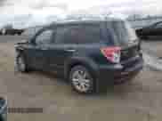 2011 Subaru Forester z VIN JF2SHBHC7BH719649, wystawiony jako Copart lot #57782065 z przebiegiem 241 157 mil mil oraz Szkoda całkowita • Salvage title. Historia ofert i sprzedaży dostępna na DreamBid. Obrazek 2.