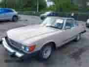 1983 Mercedes-Benz 380 SL with VIN WDBBA45A1DB020815, listed as a IAAI auction lot 42548157 with 104,615 mi miles and . Bid and sale history available at DreamBid. Image 2.