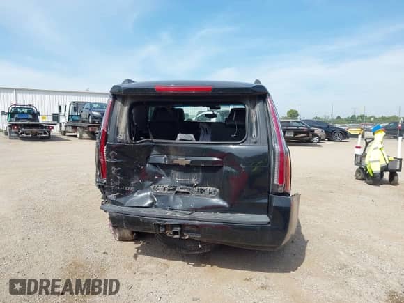 2015 Chevrolet Tahoe LT with VIN 1GNSKBKC9FR158211, listed as a IAAI auction lot 43094500 with 221,133 mi miles and . Bid and sale history available at DreamBid. Image 15.