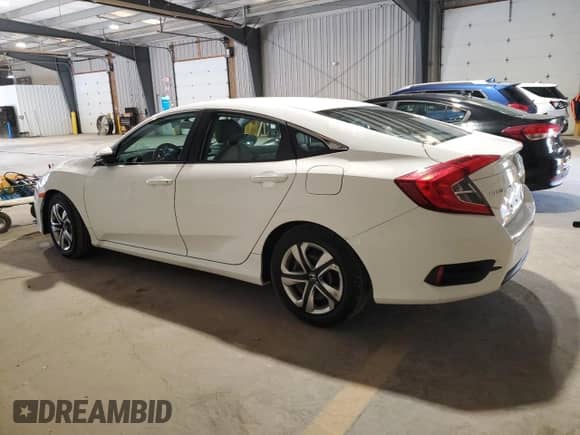 2016 Honda Civic LX with VIN 2HGFC2F59GH521998, listed as a Copart auction lot 82564575 with 94,343 mi miles and Salvage title. Bid and sale history available at DreamBid. Image 2.