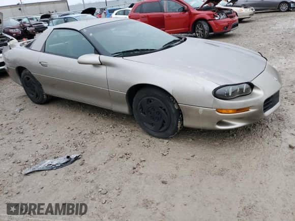 2001 Chevrolet Camaro z VIN 2G1FP22KX12125595, wystawiony jako Copart lot #81408024 z przebiegiem 187 000 mil mil oraz Czysty tytuł • Clean title. Historia ofert i sprzedaży dostępna na DreamBid. Obrazek 4.