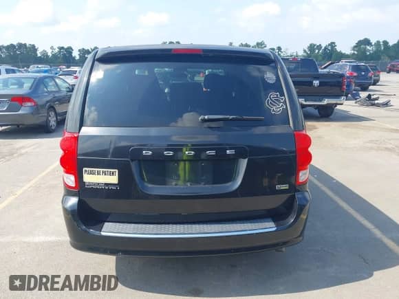 2012 Dodge Grand Caravan American Value z VIN 2C4RDGBG2CR224511, wystawiony jako IAAI lot #43020527 z przebiegiem 245 722 mil mil oraz . Historia ofert i sprzedaży dostępna na DreamBid. Obrazek 16.