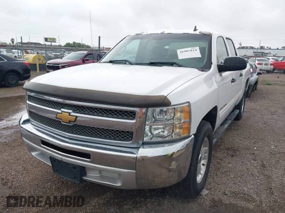 2012 Chevrolet Silverado 1500 LS z VIN 3GCPCREAXCG128550, wystawiony jako IAAI lot #41903814 z przebiegiem 248 558 mil mil oraz . Historia ofert i sprzedaży dostępna na DreamBid. Obrazek 18.