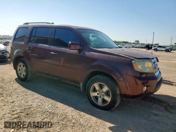 2011 Honda Pilot EX with VIN 5FNYF3H46BB051484, listed as a Copart auction lot 83973515 with 198,528 mi miles and Salvage title. Bid and sale history available at DreamBid. Image 4.