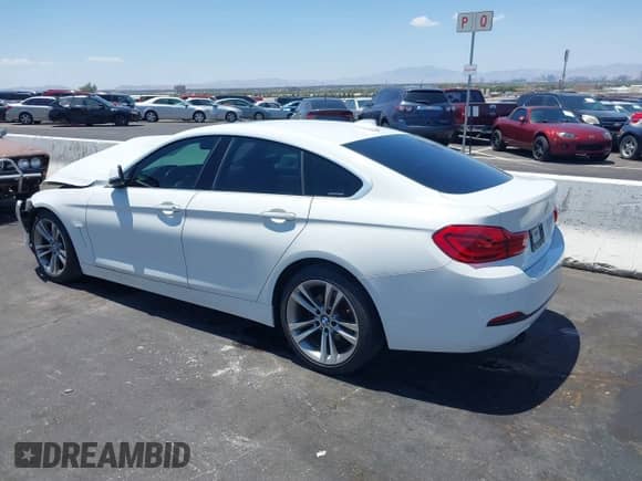 2018 BMW 4 Series 430i with VIN WBA4J1C50JBG75834, listed as a IAAI auction lot 42479042 with 67,478 mi miles and . Bid and sale history available at DreamBid. Image 3.