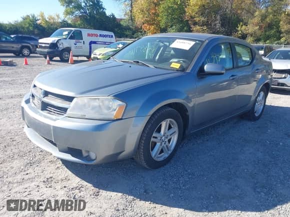 2010 Dodge Avenger R/T with VIN 1B3CC5FB3AN227425, listed as a IAAI auction lot 43488716 with 164,223 mi miles and . Bid and sale history available at DreamBid. Image 2.