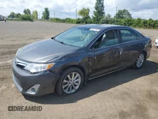 2014 Toyota Camry SE with VIN 4T1BF1FK2EU788636, listed as a Copart auction lot 68917645 with 113,900 mi miles and Salvage title. Bid and sale history available at DreamBid. Image 1.