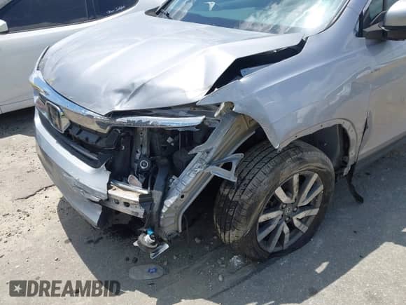 2020 Honda Pilot EX-L z VIN 5FNYF6H51LB067958, wystawiony jako IAAI lot #42799028 z przebiegiem 87 038 mil mil oraz . Historia ofert i sprzedaży dostępna na DreamBid. Obrazek 6.