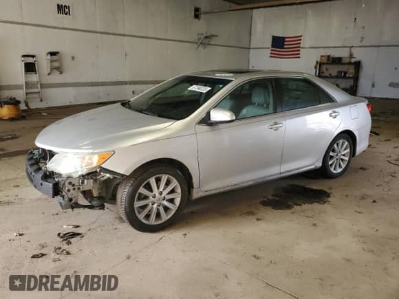 2012 Toyota Camry XLE with VIN 4T1BK1FK9CU524502, listed as a Copart auction lot 87398335 with 229,910 mi miles and Clean title. Bid and sale history available at DreamBid. Image 1.