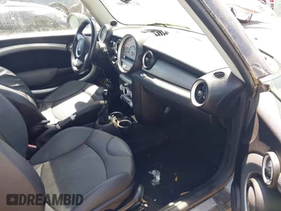 2009 MINI Hardtop S with VIN WMWMF73579TT96047, listed as a IAAI auction lot 42294180 with 109,331 mi miles and . Bid and sale history available at DreamBid. Image 5.