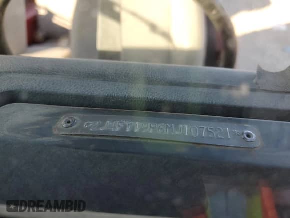 1991 Jeep Wrangler with VIN 2J4FY19P6MJ107521, listed as a Copart auction lot 84077214 with 1,311,216 mi miles and Clean title. Bid and sale history available at DreamBid. Image 12.