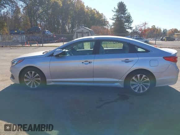 2015 Hyundai Sonata Sport with VIN 5NPE34AF3FH023033, listed as a IAAI auction lot 43522697 with 57,603 mi miles and . Bid and sale history available at DreamBid. Image 14.