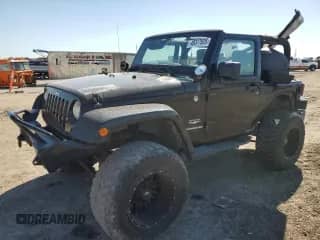 2012 Jeep Wrangler Sahara with VIN 1C4AJWBG1CL216425, listed as a Copart auction lot 48377825 with 99,649 mi miles and Salvage title. Bid and sale history available at DreamBid. Image 1.