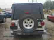 2004 Jeep Wrangler Sport z VIN 1J4FA49SX4P764853, wystawiony jako Copart lot #67621195 z przebiegiem 183 544 mil mil oraz Szkoda całkowita • Salvage title. Historia ofert i sprzedaży dostępna na DreamBid. Obrazek 6.