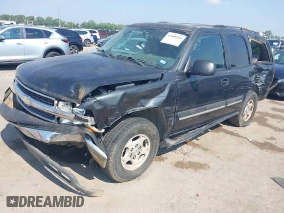 2004 Chevrolet Tahoe LS z VIN 1GNEC13V34R295484, wystawiony jako IAAI lot #42888588 z przebiegiem 150 250 mil mil oraz . Historia ofert i sprzedaży dostępna na DreamBid. Obrazek 2.