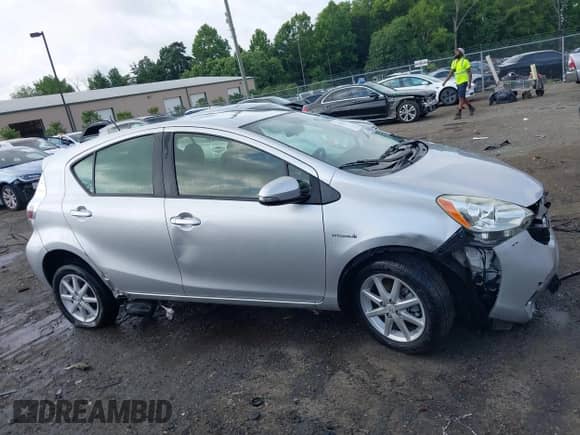 2014 Toyota Prius One with VIN JTDKDTB30E1075790, listed as a IAAI auction lot 42592812 with 100,821 mi miles and . Bid and sale history available at DreamBid. Image 14.