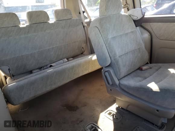 2000 Honda Odyssey EX with VIN 2HKRL1863YH571364, listed as a Copart auction lot 81698305 with 235,316 mi miles and Salvage title. Bid and sale history available at DreamBid. Image 11.