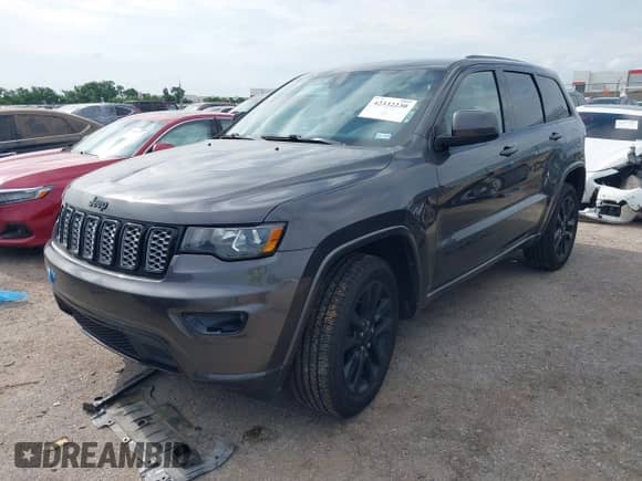 2018 Jeep Grand Cherokee Laredo с VIN 1C4RJFAG7JC105959, выставлен на аукционе IAAI как лот 42332230 с пробегом 125 386 миль миль и . История ставок и продаж доступна на DreamBid. Изображение 2.