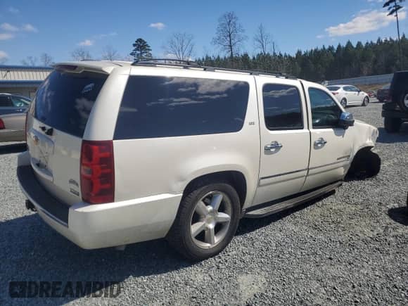 2012 Chevrolet Suburban LTZ с VIN 1GNSCKE04CR327982, выставлен на аукционе Copart как лот 49387775 с пробегом 201 456 миль миль и Списание • Salvage title. История ставок и продаж доступна на DreamBid. Изображение 3.