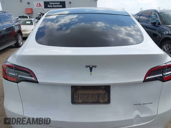 2021 Tesla Model Y Long Range with VIN 5YJYGDEE0MF095080, listed as a IAAI auction lot 42931169 with Not provided miles and . Bid and sale history available at DreamBid. Image 15.