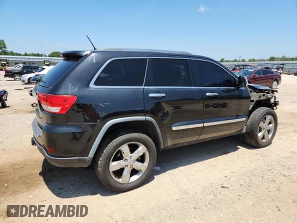 2012 Jeep Grand Cherokee Overland with VIN 1C4RJFCT9CC346497, listed as a Copart auction lot 63004635 with 142,623 mi miles and Salvage title. Bid and sale history available at DreamBid. Image 3.