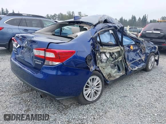2017 Subaru Impreza Premium with VIN 4S3GKAB67H3622590, listed as a IAAI auction lot 43090070 with 74,876 mi miles and . Bid and sale history available at DreamBid. Image 4.