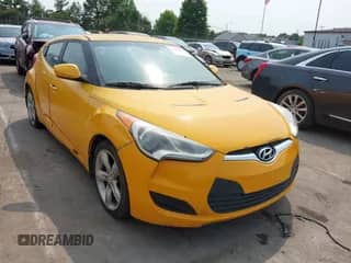 2012 Hyundai Veloster w/Gray Int z VIN KMHTC6AD5CU039913, wystawiony jako IAAI lot #42409269 z przebiegiem 177 079 mil mil oraz . Historia ofert i sprzedaży dostępna na DreamBid. Obrazek 1.