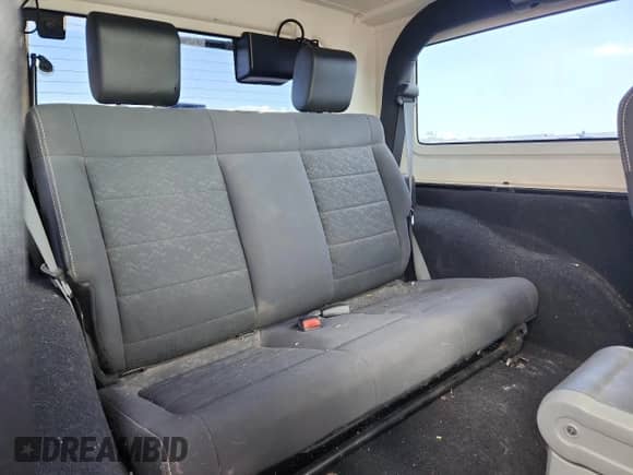 2010 Jeep Wrangler Sport с VIN 1J4AA2D14AL216685, выставлен на аукционе Copart как лот 80406425 с пробегом 246 537 миль миль и Списание • Salvage title. История ставок и продаж доступна на DreamBid. Изображение 11.