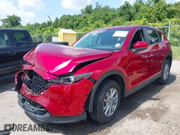 2023 Mazda CX-5 S Carbon Edition z VIN JM3KFBCM5P0134148, wystawiony jako IAAI lot #42455010 z przebiegiem 57 414 mil mil oraz . Historia ofert i sprzedaży dostępna na DreamBid. Obrazek 2.