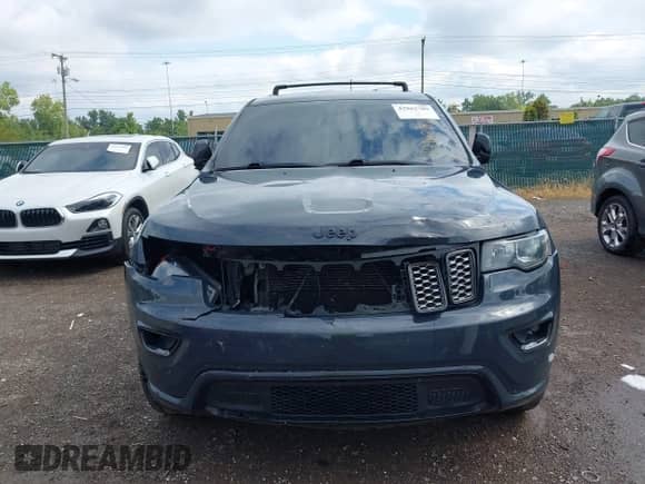 2018 Jeep Grand Cherokee Altitude z VIN 1C4RJFAG8JC189970, wystawiony jako IAAI lot #42962789 z przebiegiem 148 200 mil mil oraz . Historia ofert i sprzedaży dostępna na DreamBid. Obrazek 12.