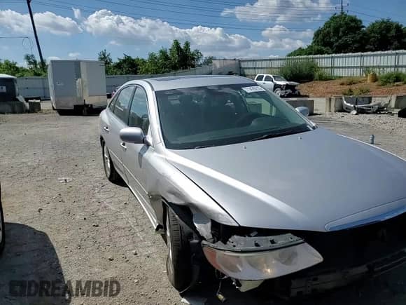 2006 Hyundai Azera SE с VIN KMHFC46F66A121649, выставлен на аукционе Copart как лот 71426215 с пробегом 173 484 миль миль и Списание • Salvage title. История ставок и продаж доступна на DreamBid. Изображение 14.