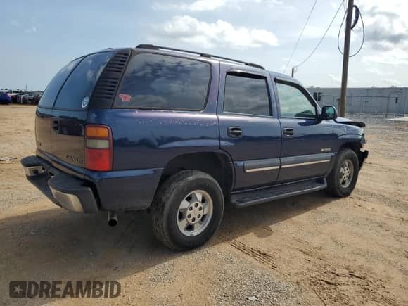 2003 Chevrolet Tahoe LS с VIN 1GNEC13V43J306117, выставлен на аукционе Copart как лот 59766175 с пробегом 218 711 миль миль и Списание • Salvage title. История ставок и продаж доступна на DreamBid. Изображение 3.