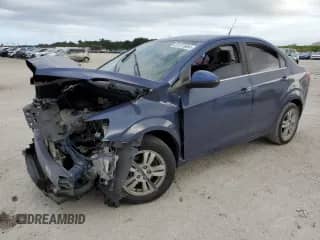 2014 Chevrolet Sonic LT с VIN 1G1JC5SB5E4181306, выставлен на аукционе Copart как лот 64234835 с пробегом 116 890 миль миль и На запчасти • Non repairable. История ставок и продаж доступна на DreamBid. Изображение 1.
