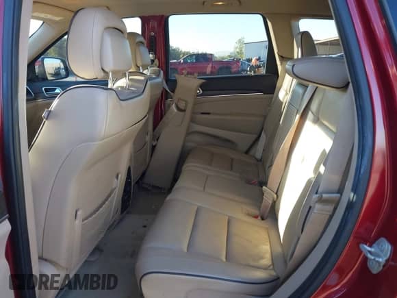 2015 Jeep Grand Cherokee Overland z VIN 1C4RJFCG6FC613232, wystawiony jako IAAI lot #43476794 z przebiegiem 106 697 mil mil oraz . Historia ofert i sprzedaży dostępna na DreamBid. Obrazek 8.